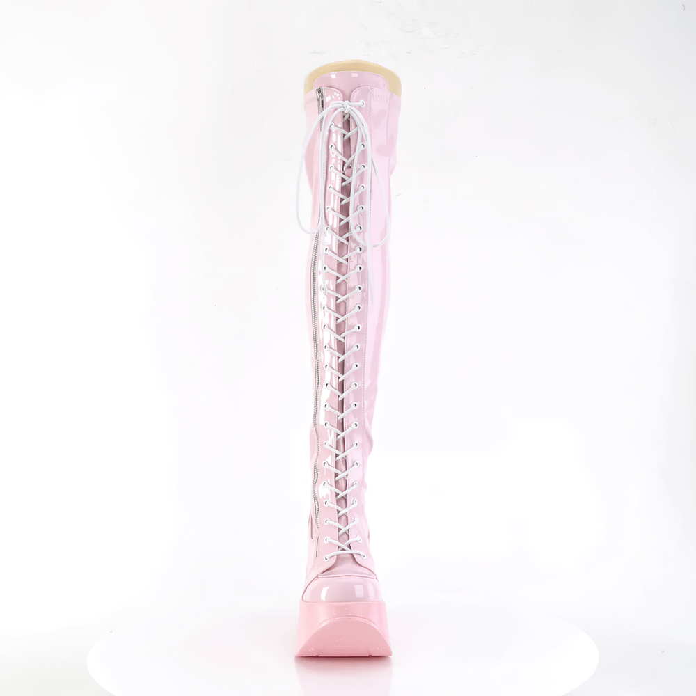 Demonia pink holographic thigh-high boots with star cutout platform, perfect for bold fashionistas and club adventures.