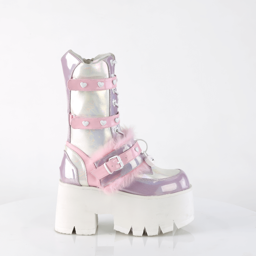 Demonia pink-lavender holographic platform boots with heart details and chunky heel, perfect for a bold Pastel Goth style.