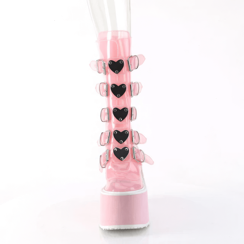 Demonia pink mid-calf platform boots with heart buckles, showcasing a whimsical and edgy design.