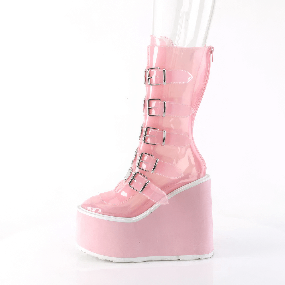 Demonia pink mid-calf platform boots with heart buckles showcasing a whimsical and edgy style.