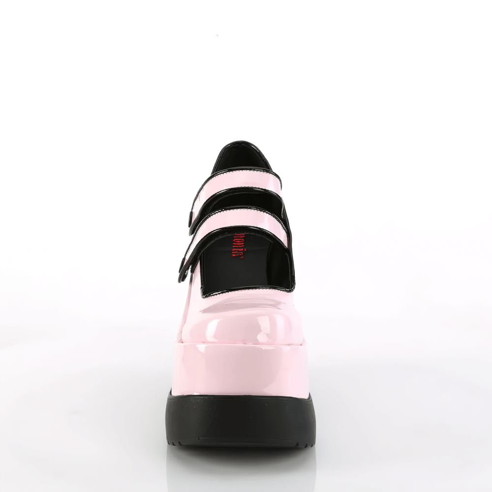 Demonia pink patent Mary Jane shoes featuring dual straps and a striking wedge platform.