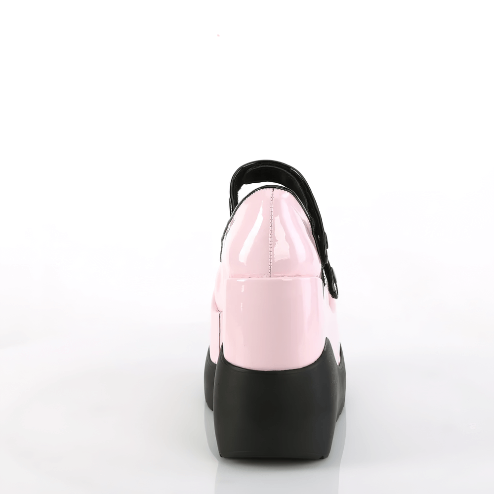 Back view of DEMONIA pink patent Mary Jane shoes with dual straps and black wedge heel.