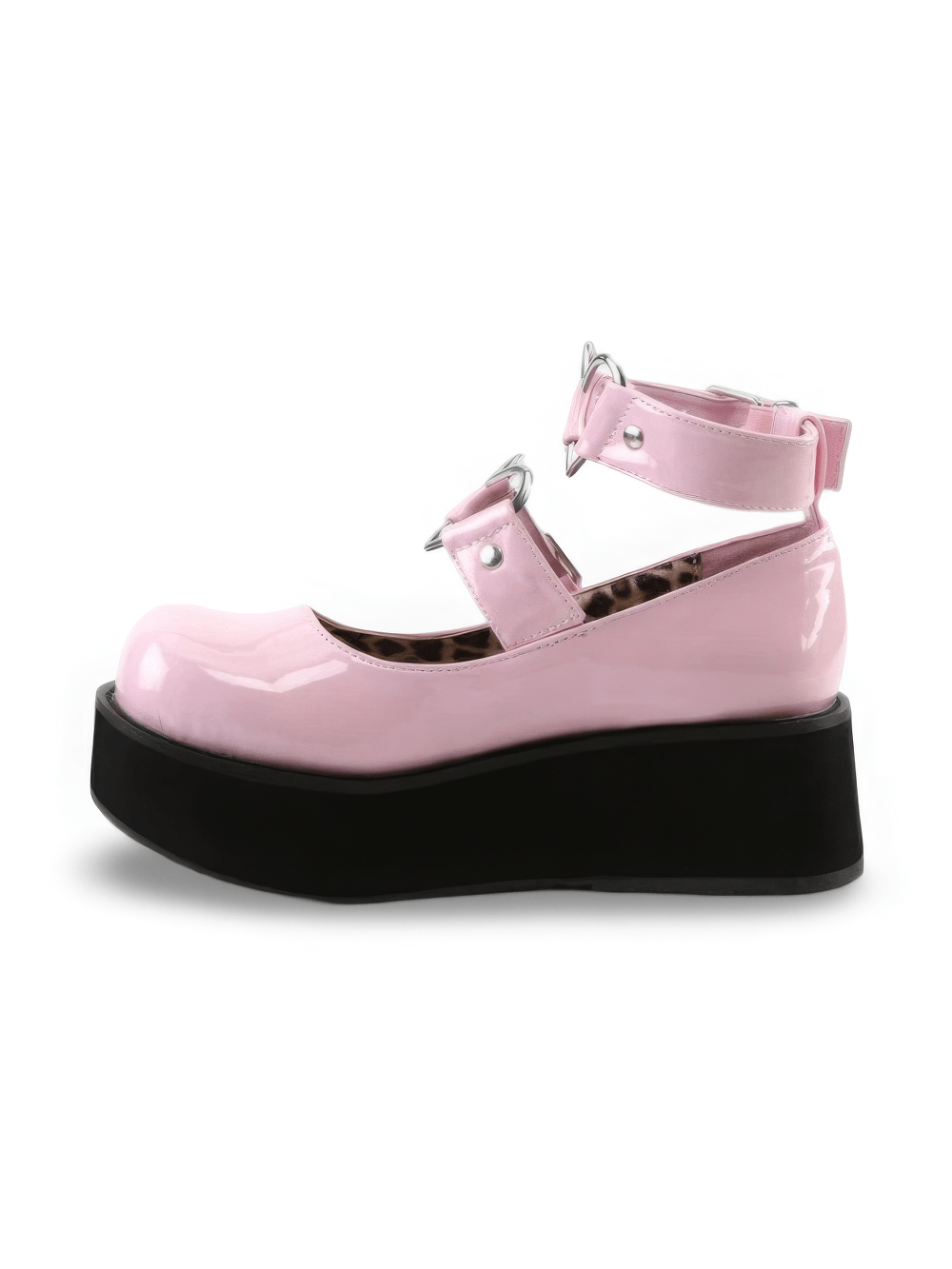 Pink patent Mary Jane shoes with heart buckles and a 2 1/4" platform for a sweet, stylish look.