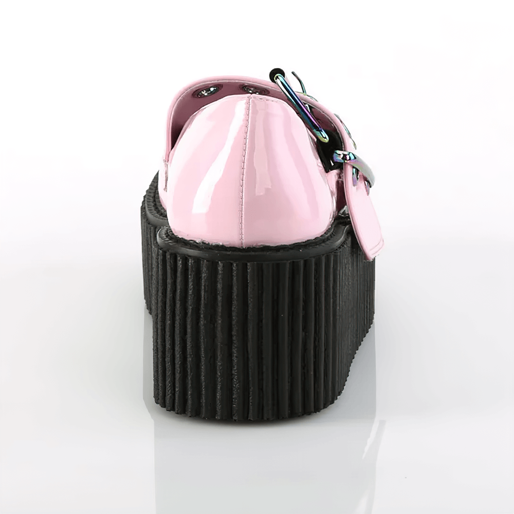 Back view of bold pink platform Mary Jane shoes with rainbow buckle and chunky sole.