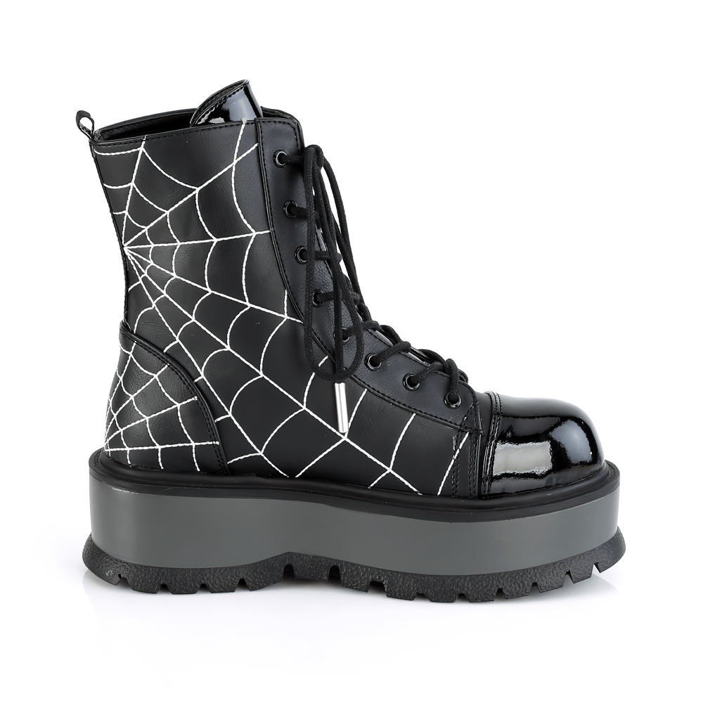 Daring Demonia platform black ankle boots with spider web design and lace-up detail on a white background.