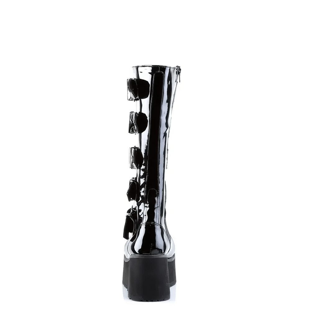 Back view of Demonia glossy black patent knee-high boots with chunky buckles and side zipper.