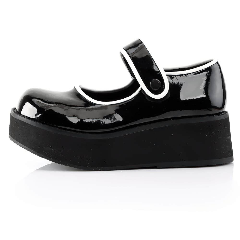 Goth punk Mary Jane platform shoes in black patent with white trim, showcasing a bold Lolita style.