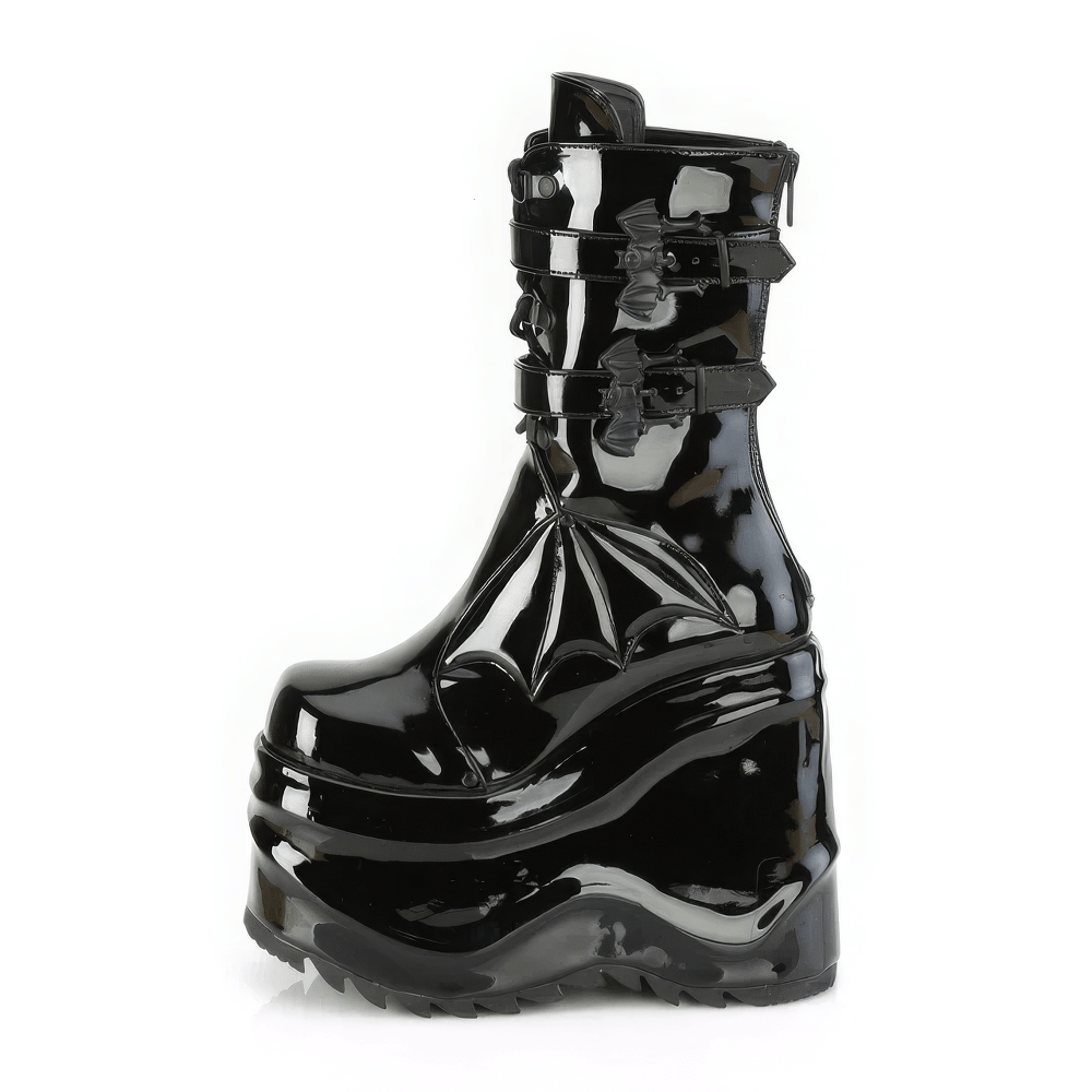 Gothic Demonia platform mid-calf boots with bat wing design and dual buckle straps, crafted in black vegan leather.