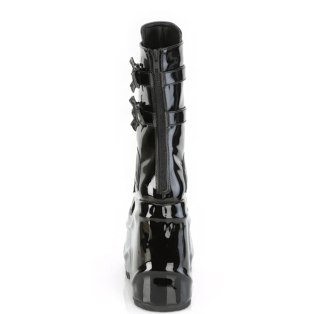 Black patent vegan leather mid-calf boots with bat buckle details and back zip closure.