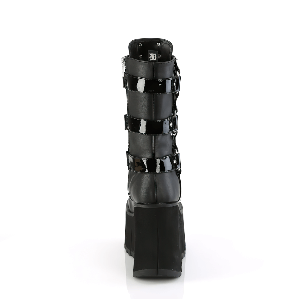 Back view of DEMONIA black vegan leather mid-calf platform boots with studded harness and adjustable straps.