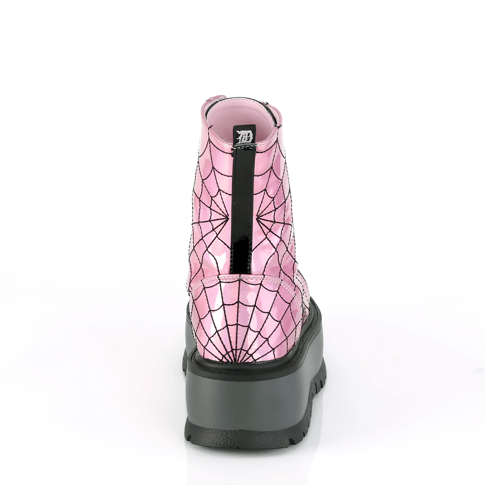 Back view of DEMONIA pink hologram ankle boots with black spider web design and 2" platform.