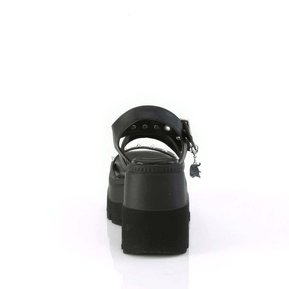 Back view of Demonia platform sandals featuring studded straps and heart buckle detail, designed for bold fashion statements.