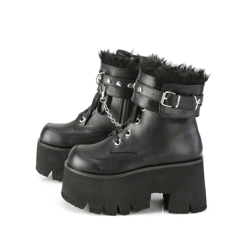 Demonia punk chunky heel ankle boots with chain detail and fur cuffs for a bold fashion statement.
