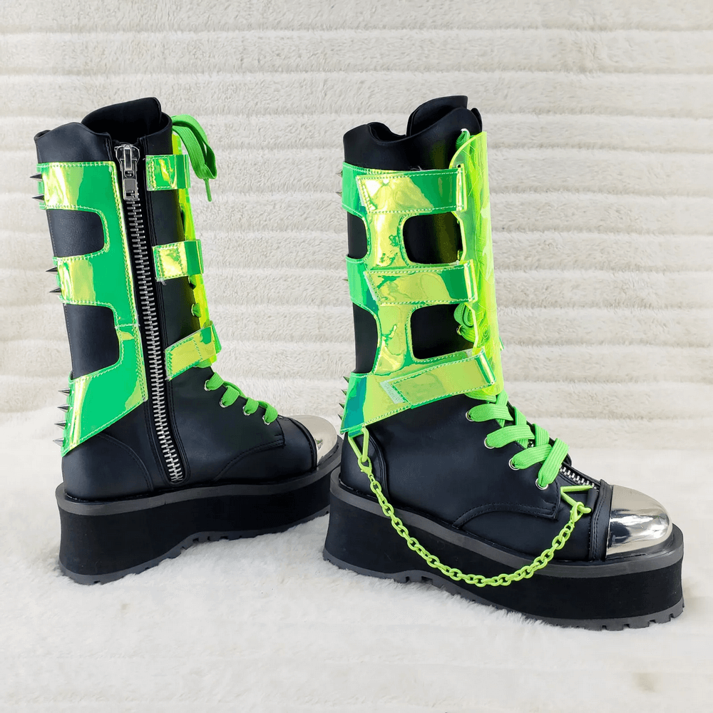 Futuristic Demonia punk mid-calf platform boots with UV-reactive straps and silver toe cap.