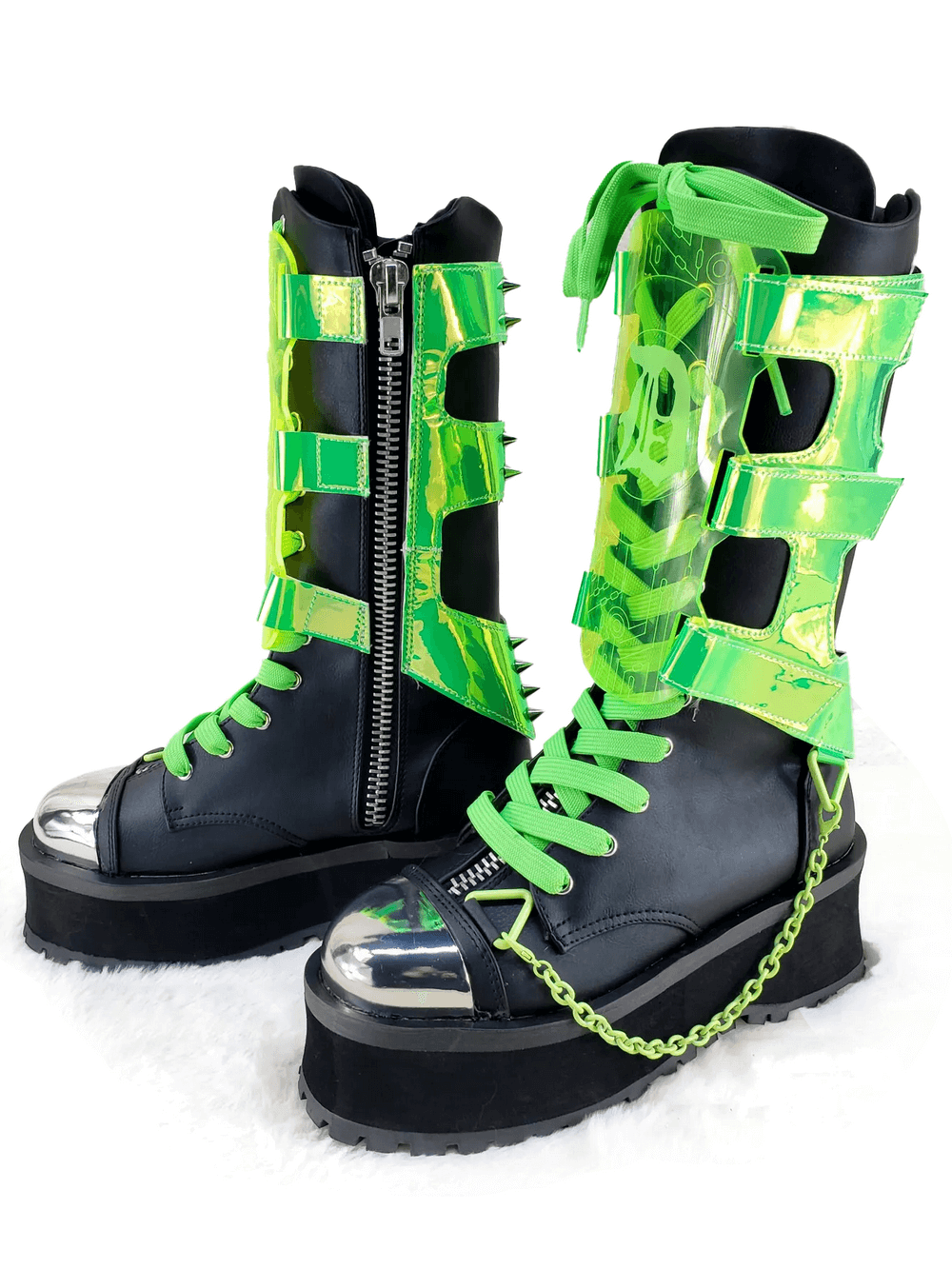 Futuristic punk mid-calf platform boots with silver toe cap, UV-reactive straps, and chain details.