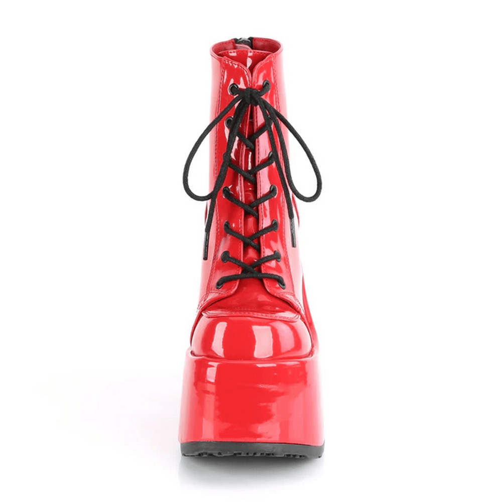 Bold red lace-up ankle platform boots with chunky heel and bold patent finish.