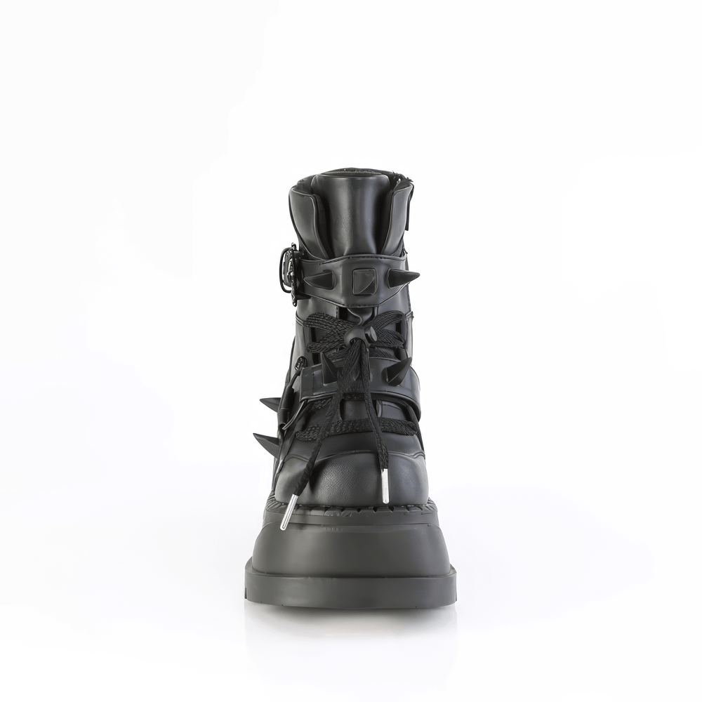 Front view of DEMONIA Skull-Buckled Ankle Boots with claw spikes, featuring lace-up design and bold gothic style.
