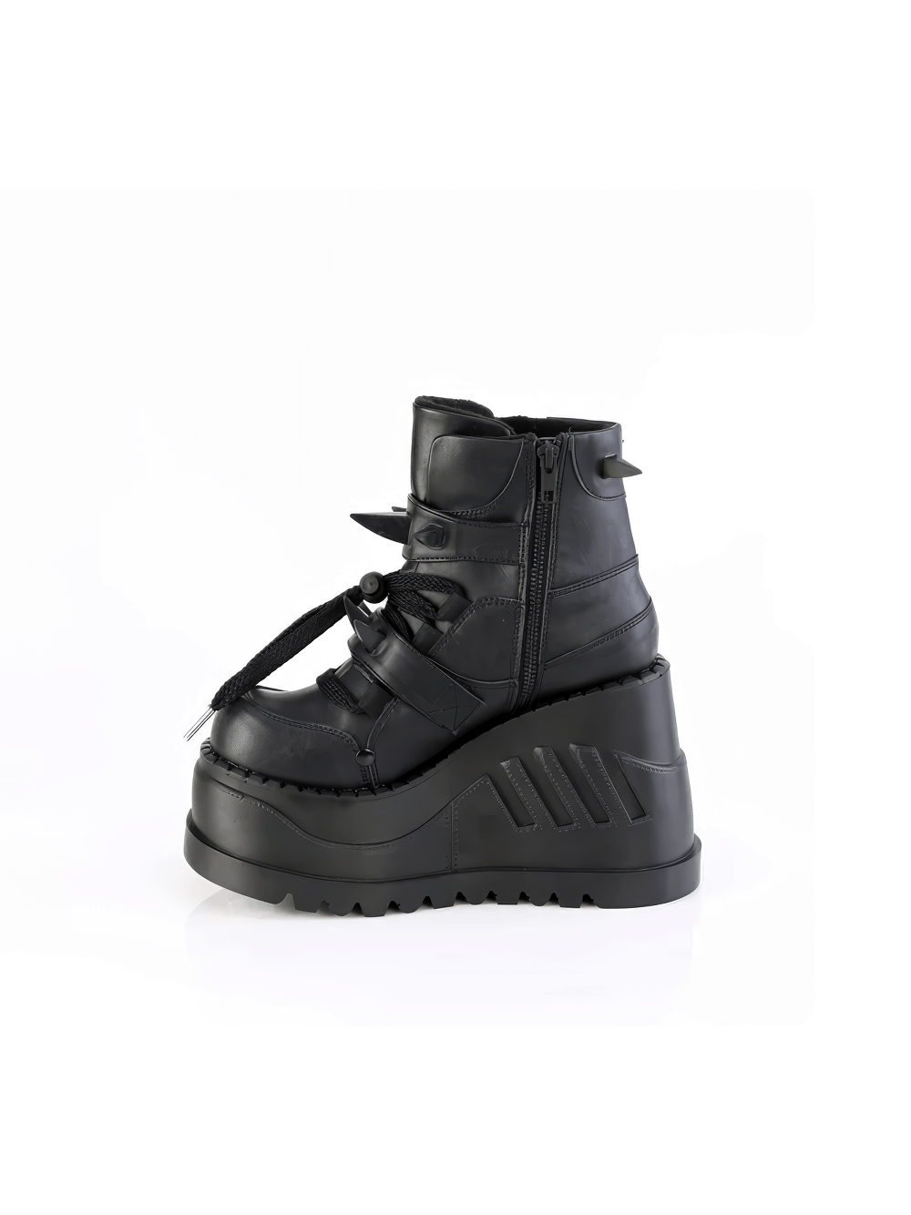 Demonia skull-buckled ankle boots with claw spikes and wedge platform, perfect for bold fashion statements.