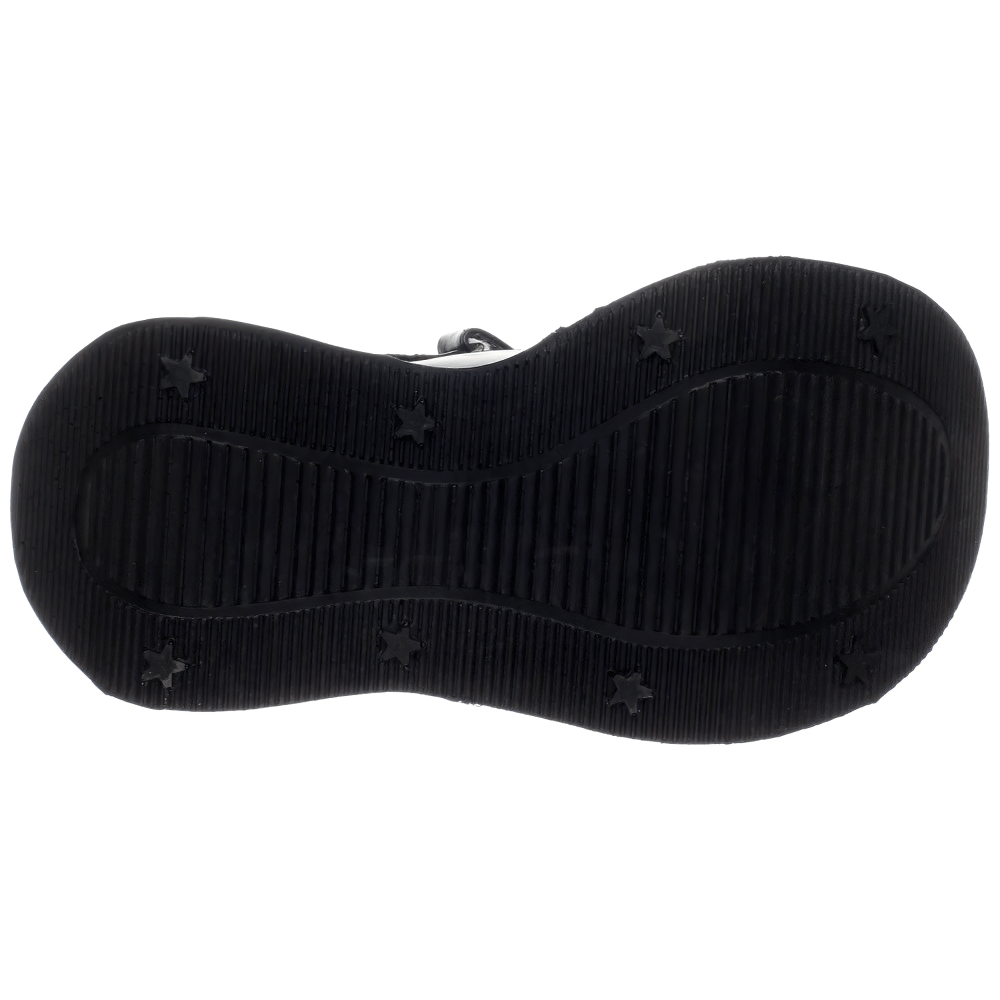 Bottom view of DEMONIA black wedge Mary Jane shoes with star cutout design, featuring durable rubber sole with star accents.