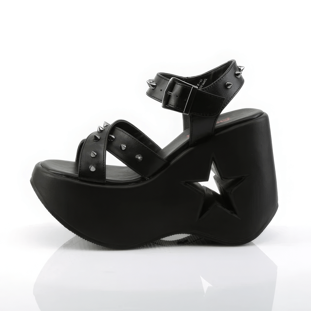 Edgy Demonia star cutout platform sandals in black vegan leather with spike details for bold fashion lovers.