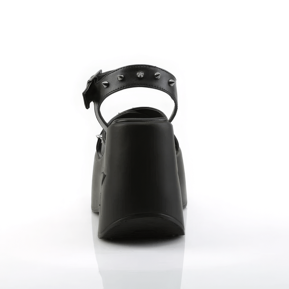 Back view of Demonia Star Cutout Platform Sandals showing spikes and ankle strap in black vegan leather.