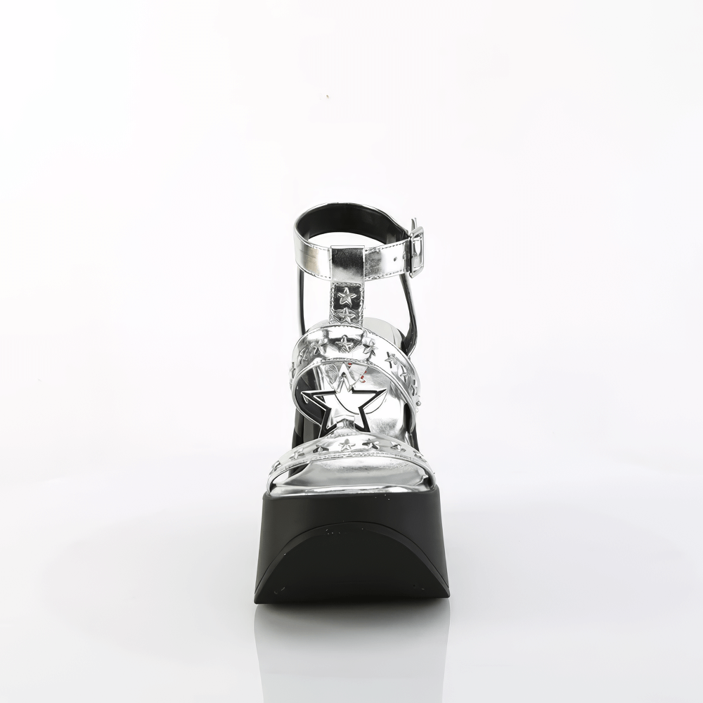 Front view of DEMONIA Star Cutout Platform Wedge Silver Sandals with star detail and ankle strap.
