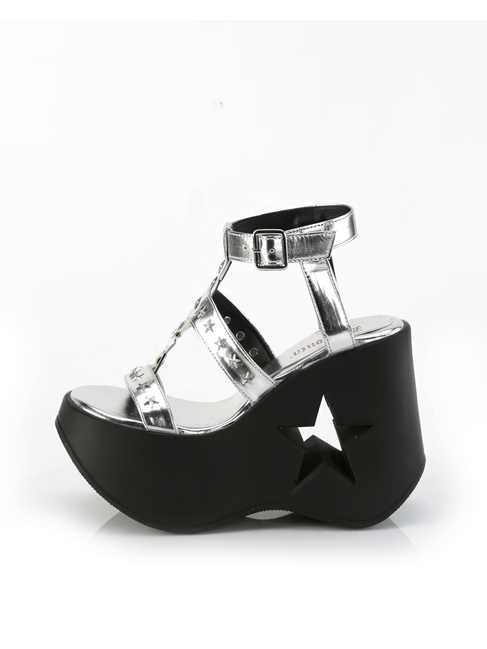 Silver star cutout platform wedge sandals, featuring ankle straps and star detailing, perfect for festive occasions.