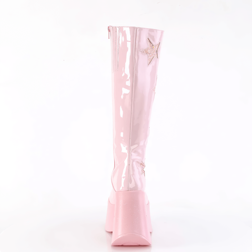 Back view of pink knee-high wedge boots with star cutouts and glitter patches, showcasing the sleek patent design.