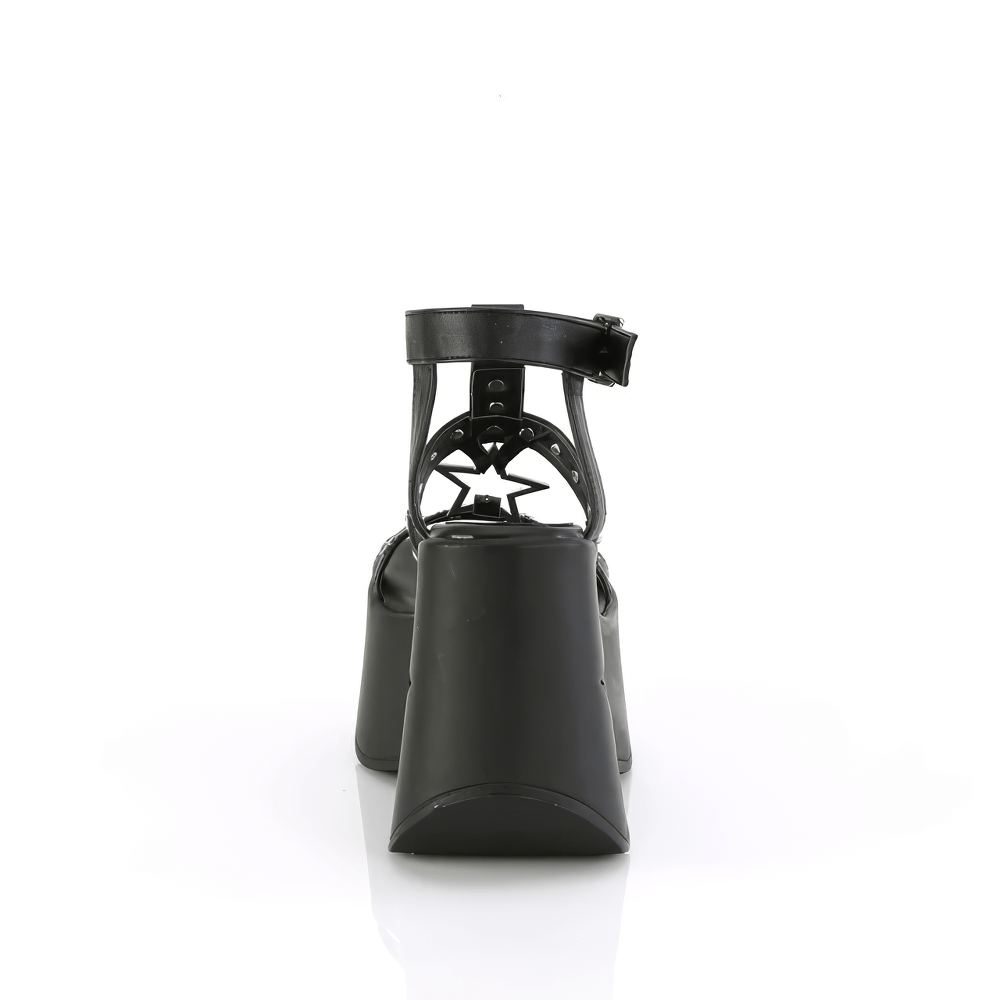 Back view of DEMONIA Star-Studded Platform Wrap-Around Strap Sandals in black vegan leather with star cutouts.