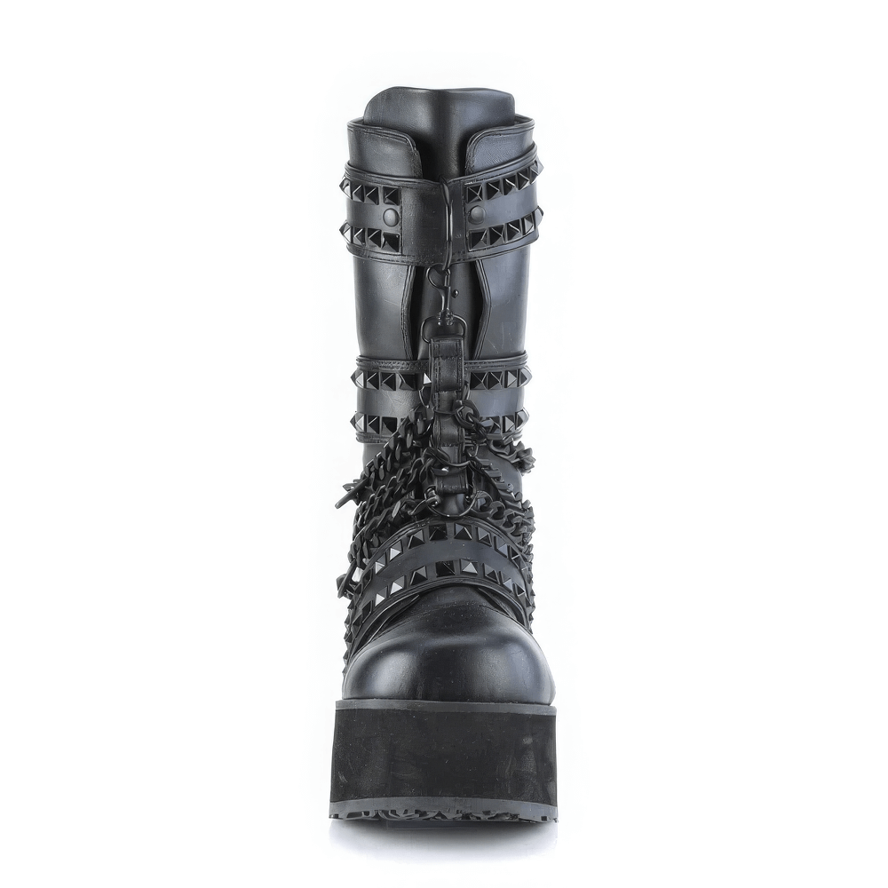 Demonia studded mid-calf boots with chain details and pyramid studs, featuring a bold black vegan leather finish.