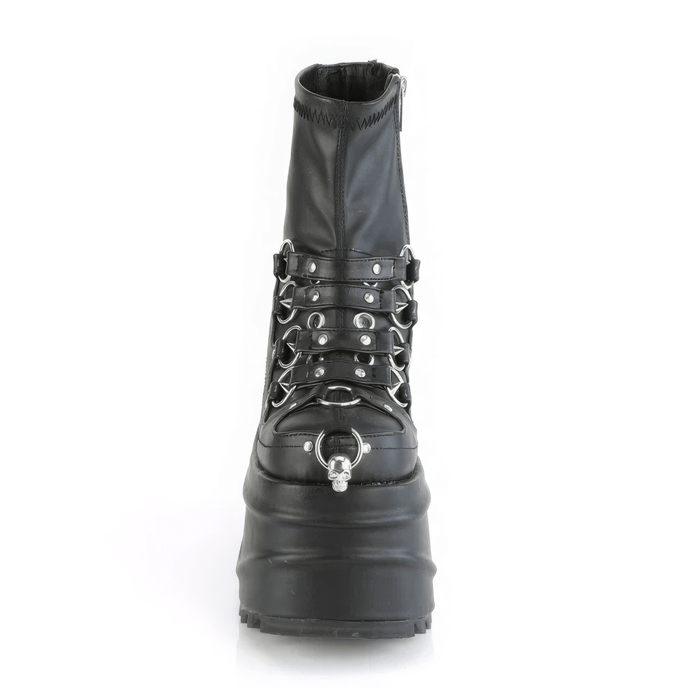 Black platform ankle boot with skull detail, spike studs, and O-rings for a rebellious style.
