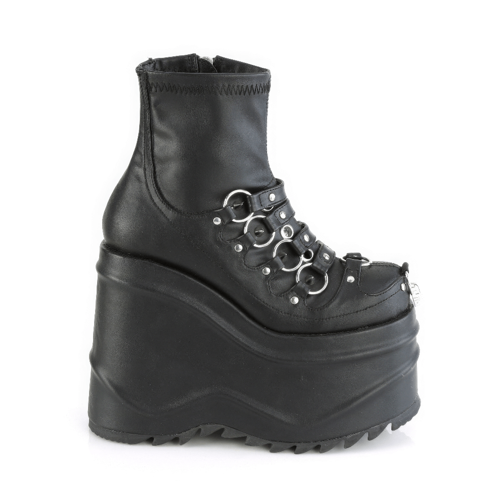 Demonia black studded platform ankle boots with O-rings and skull detail, perfect for a rebellious look.