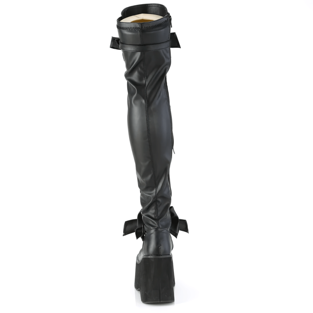 Back view of DEMONIA adjustable thigh-high platform boots featuring removable bows and dramatic D-ring laces.