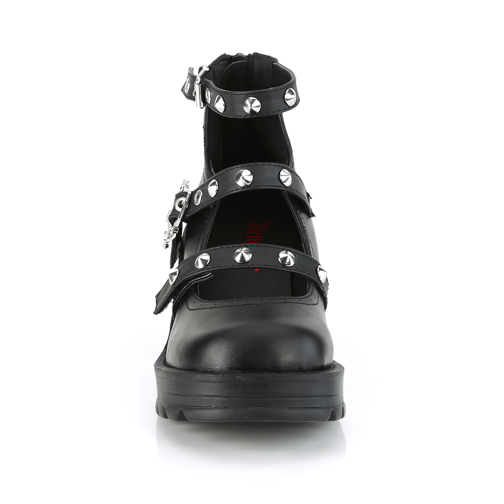 Chic black vegan leather Mary Jane pumps with studs and spider buckle, featuring a chunky heel and platform.