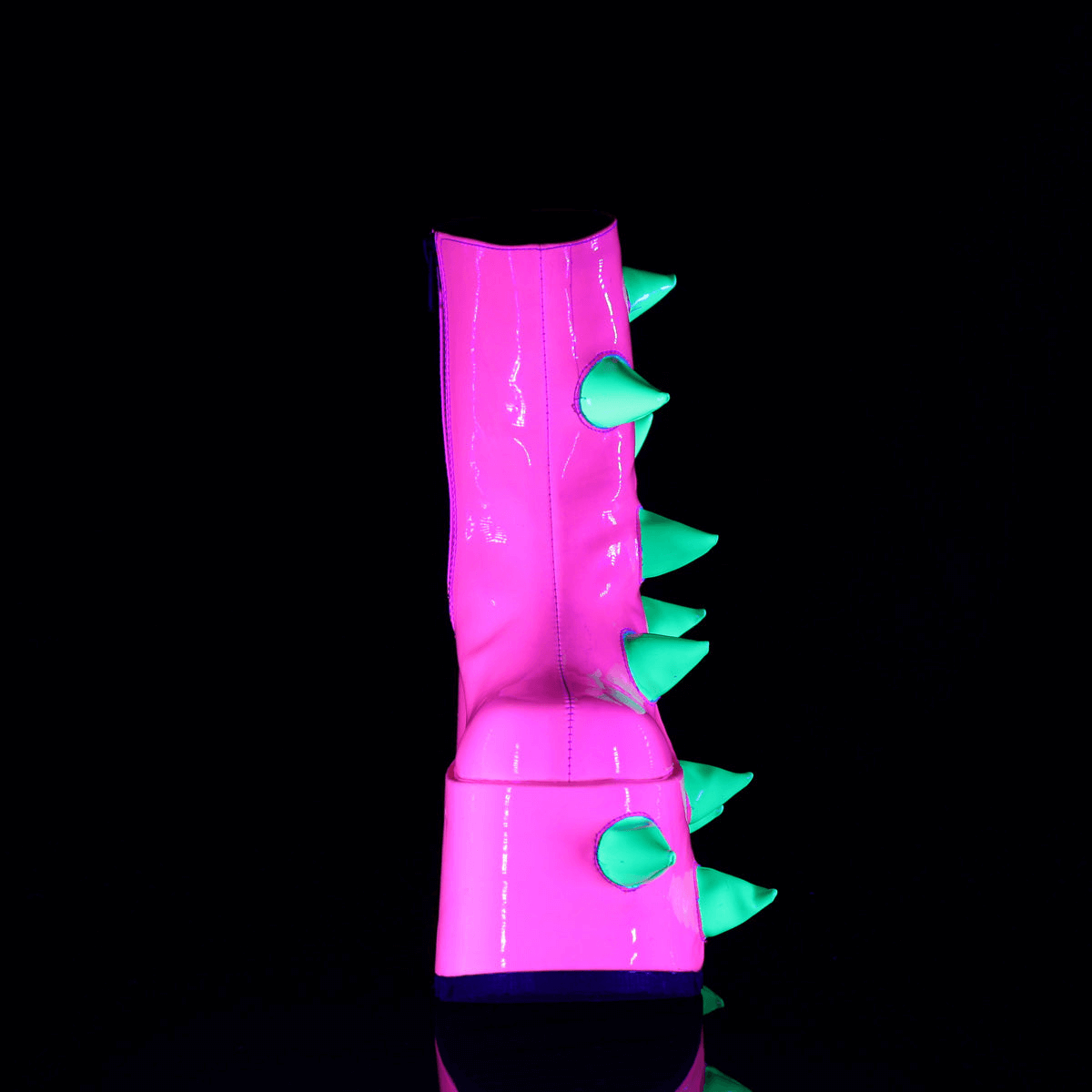 Daring Demonia UV neon pink wedge platform boots with green spikes, perfect for an avant-garde statement.