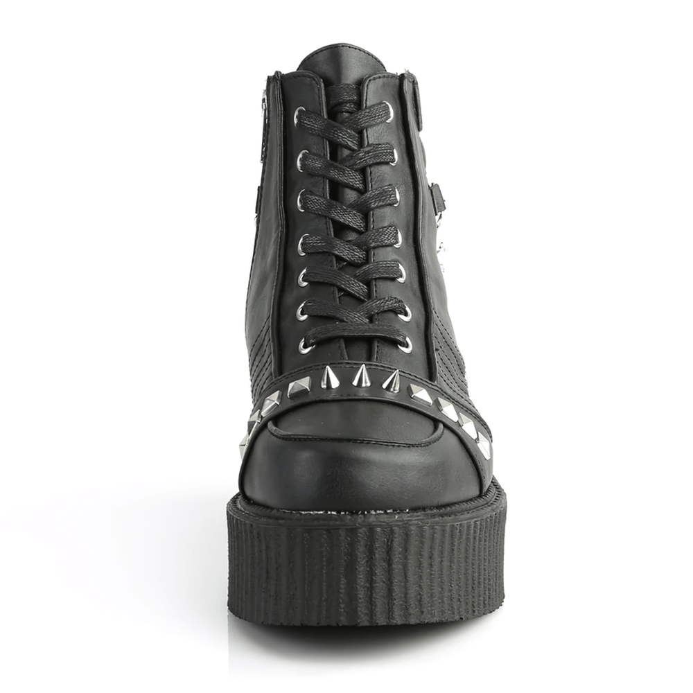 Front view of DEMONIA vegan leather creepers with studs and chains, showcasing urban style and bold design.