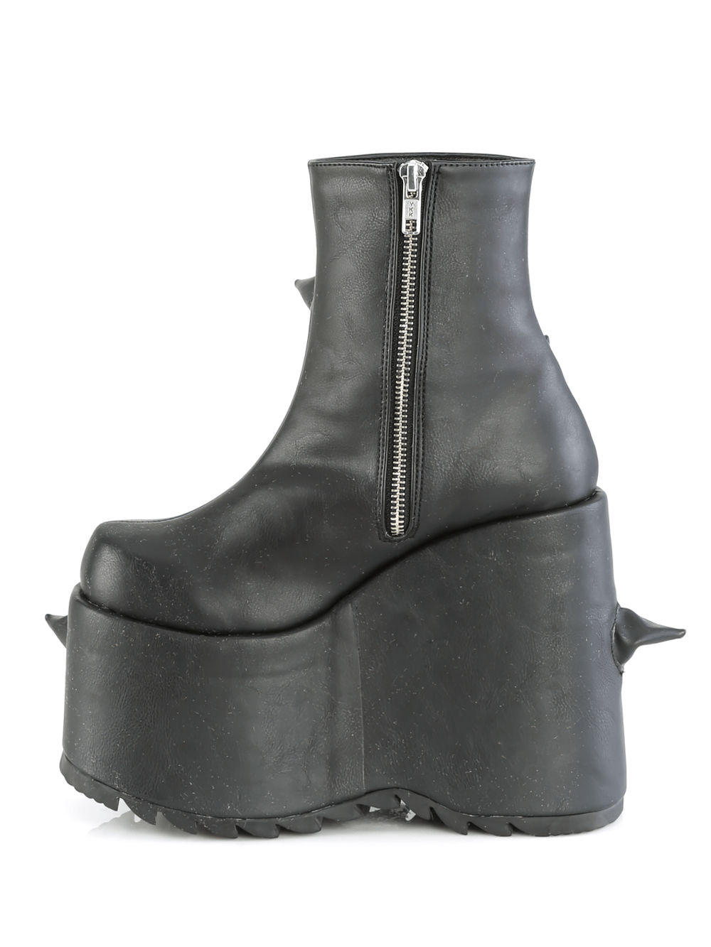 Demonia punk-inspired wedge platform ankle boots with spiked horns in sleek black vegan leather.