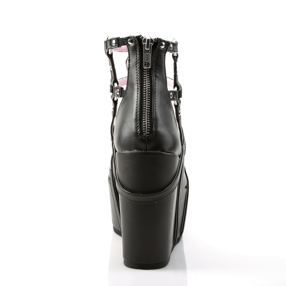 Black vegan leather wedge platform shoes with straps and zipper detail from the back view, showcasing chic design.