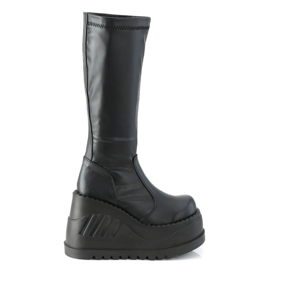 Edgy black knee-high wedge platform boots with back zip closure and metallic flair.