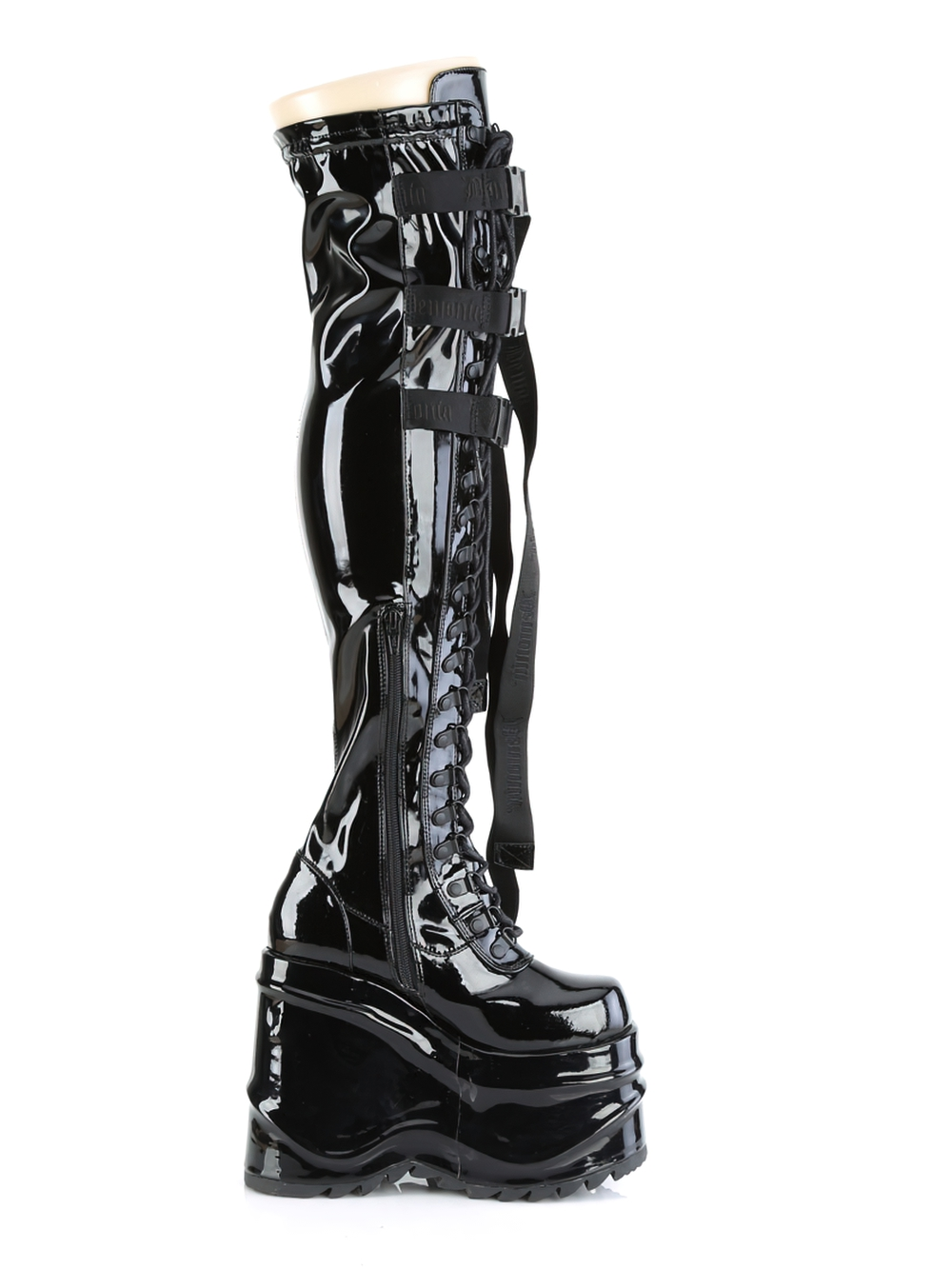 Demonia Wedge Thigh High Boots with buckle and strap detail, featuring high-shine black patent finish and lace-up design.