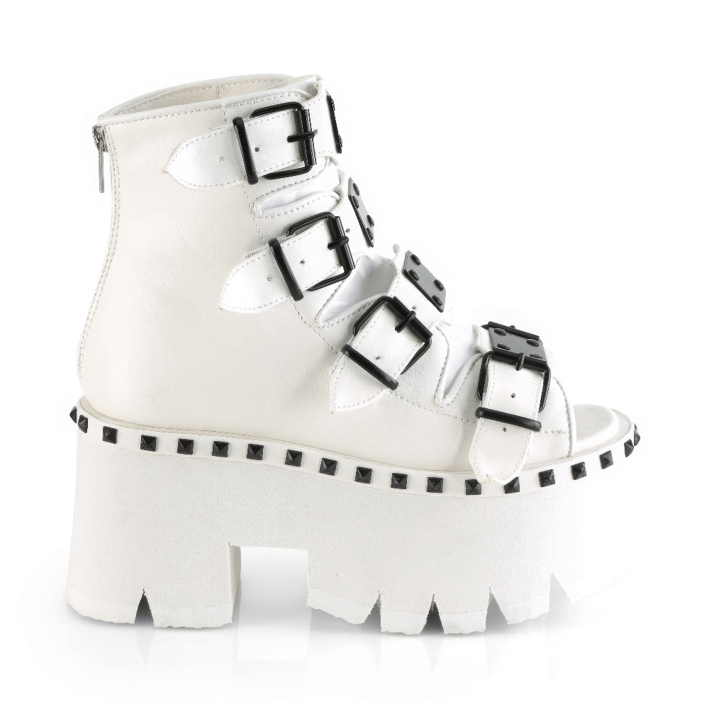 Demonia white chunky heel platform bootie sandals with buckle straps and edgy design.