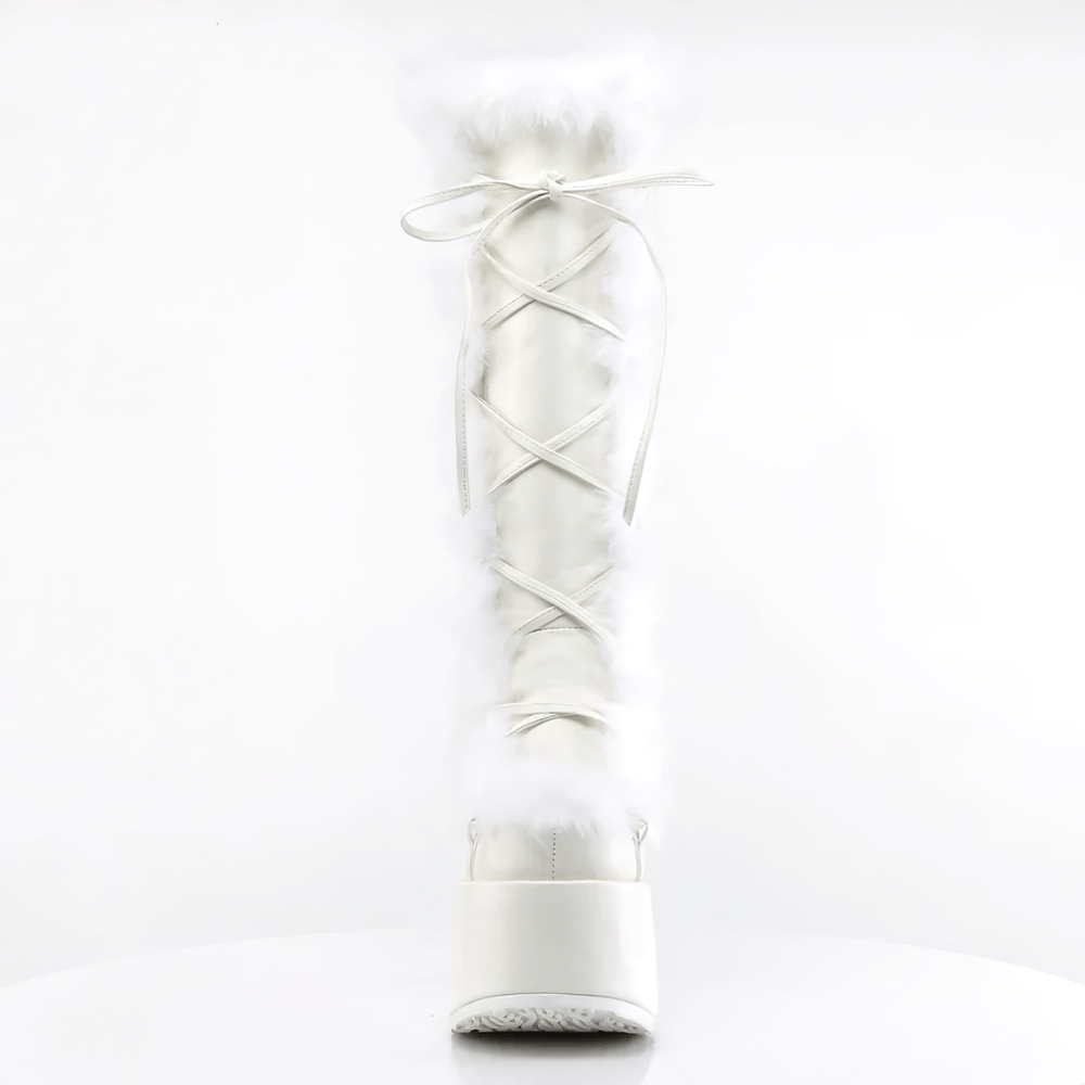 Demonia white faux fur lace-up knee-high boots with a platform heel, stylish and chic winter footwear.