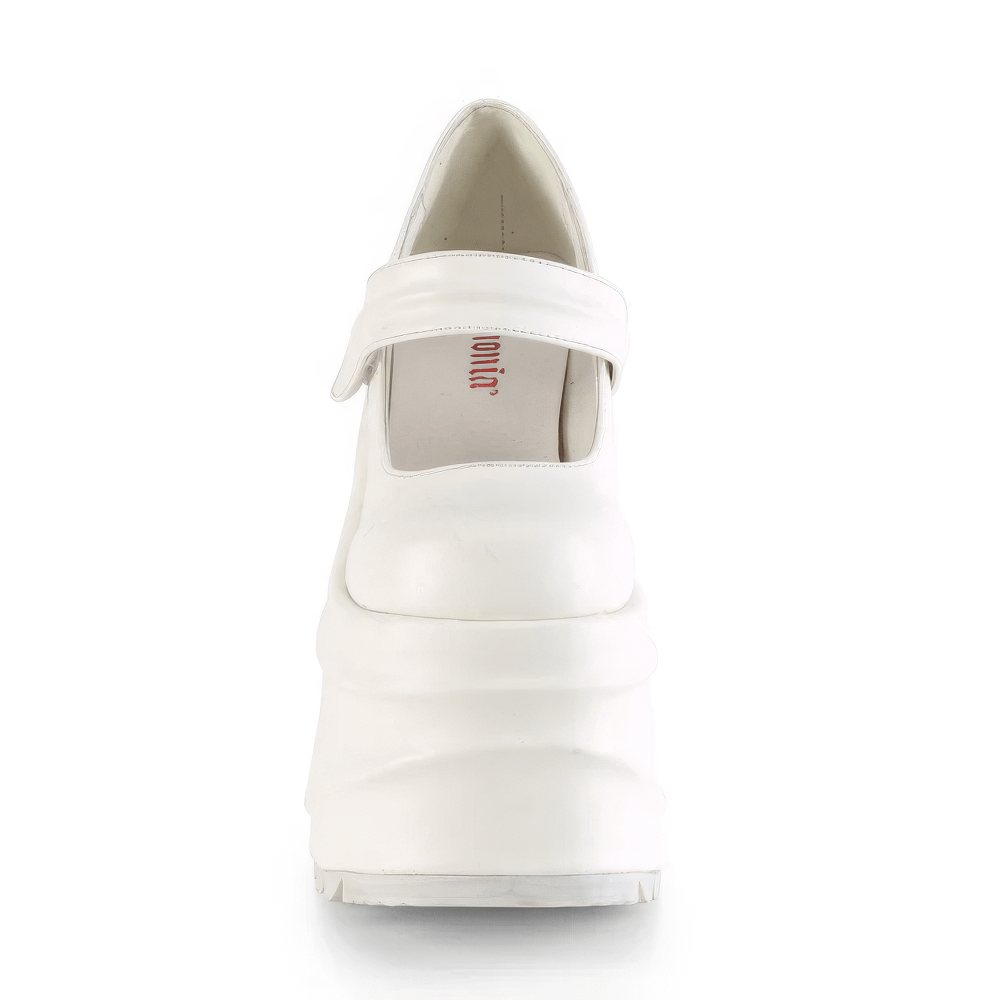 White platform Mary Jane shoes with hook and loop strap, showing a bold and modern design from the front.