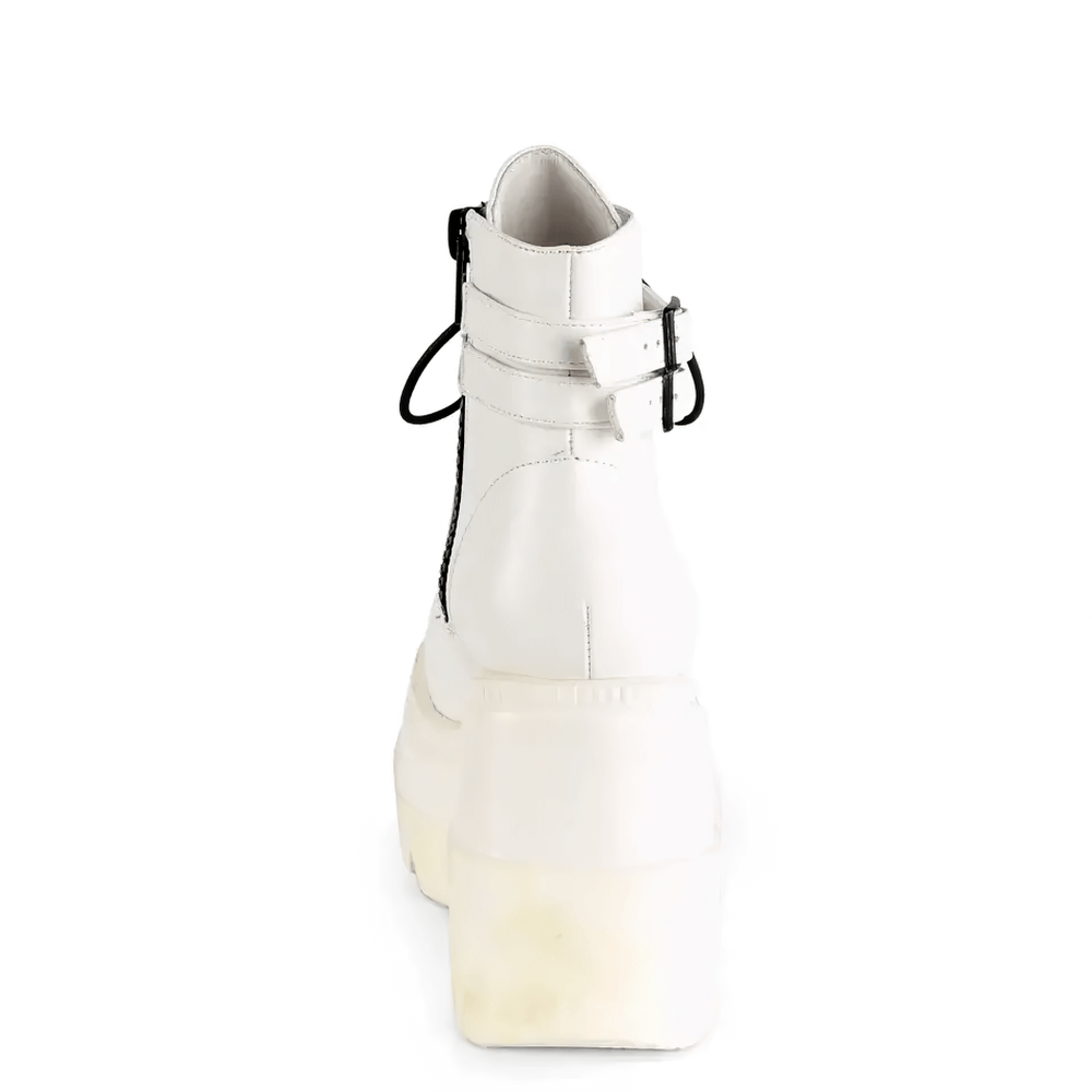 Back view of Demonia white platform ankle boots with buckle straps and lace-up design, showcasing stylish minimalist footwear.
