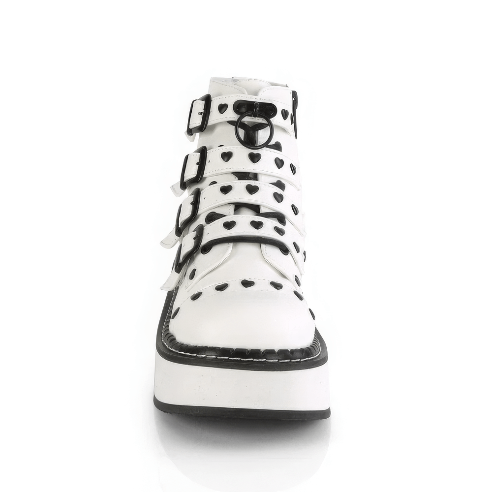 Demonia white platform buckle strap ankle boots with heart studs and O-ring detail.