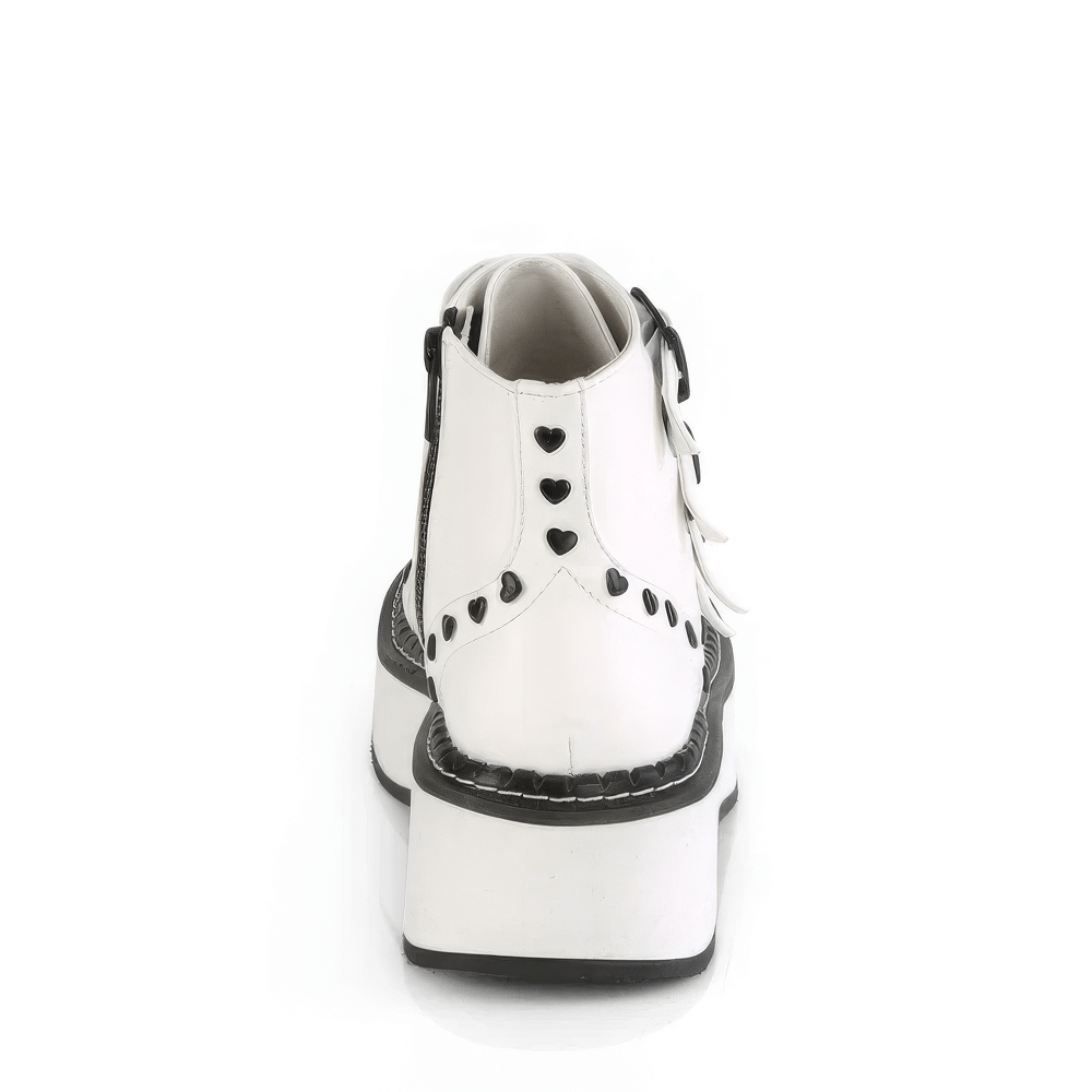 Back view of Demonia white platform ankle boots with heart studs and buckle straps, showcasing trendy style.