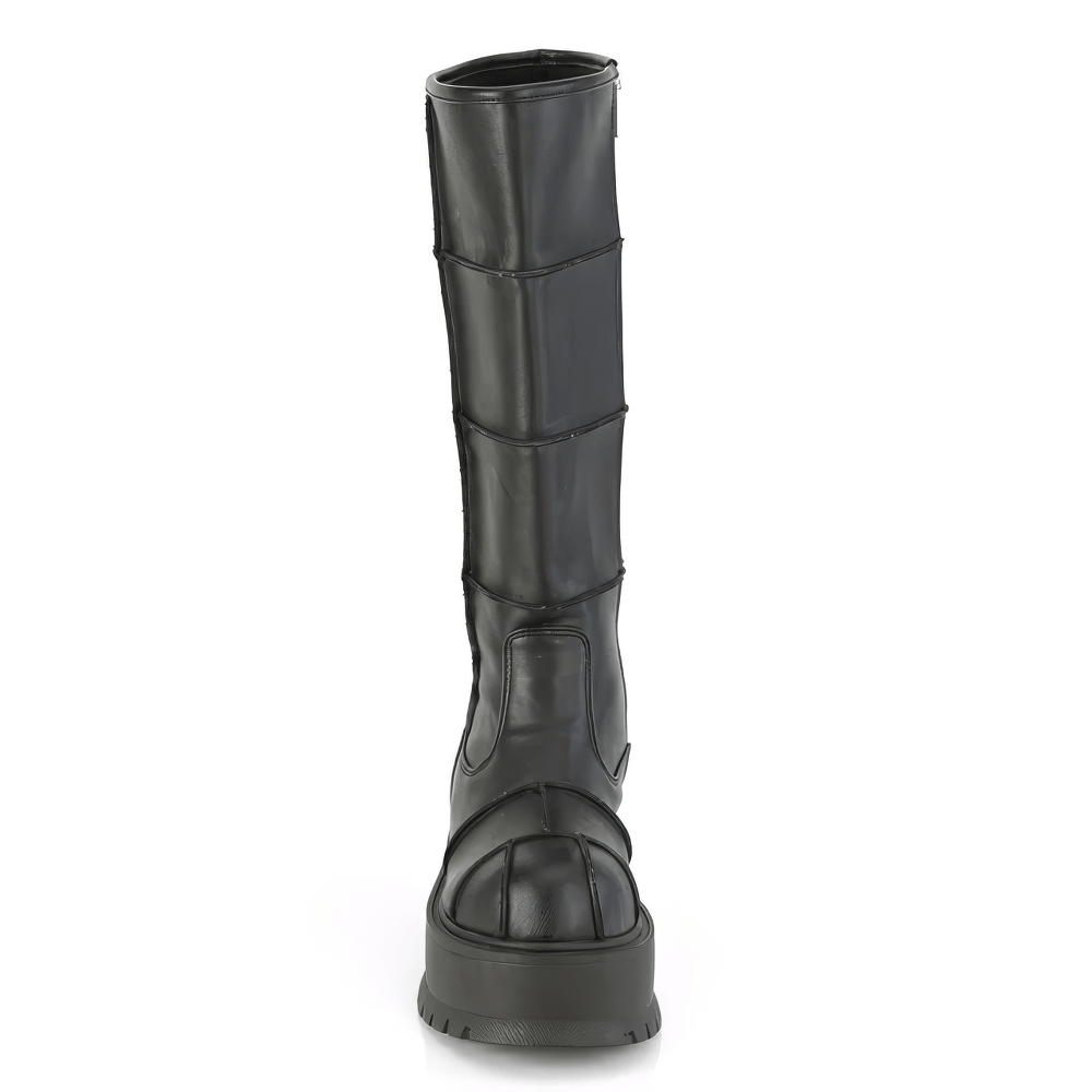 Daring black knee high platform boots with distinct patching details and inside zip for women.