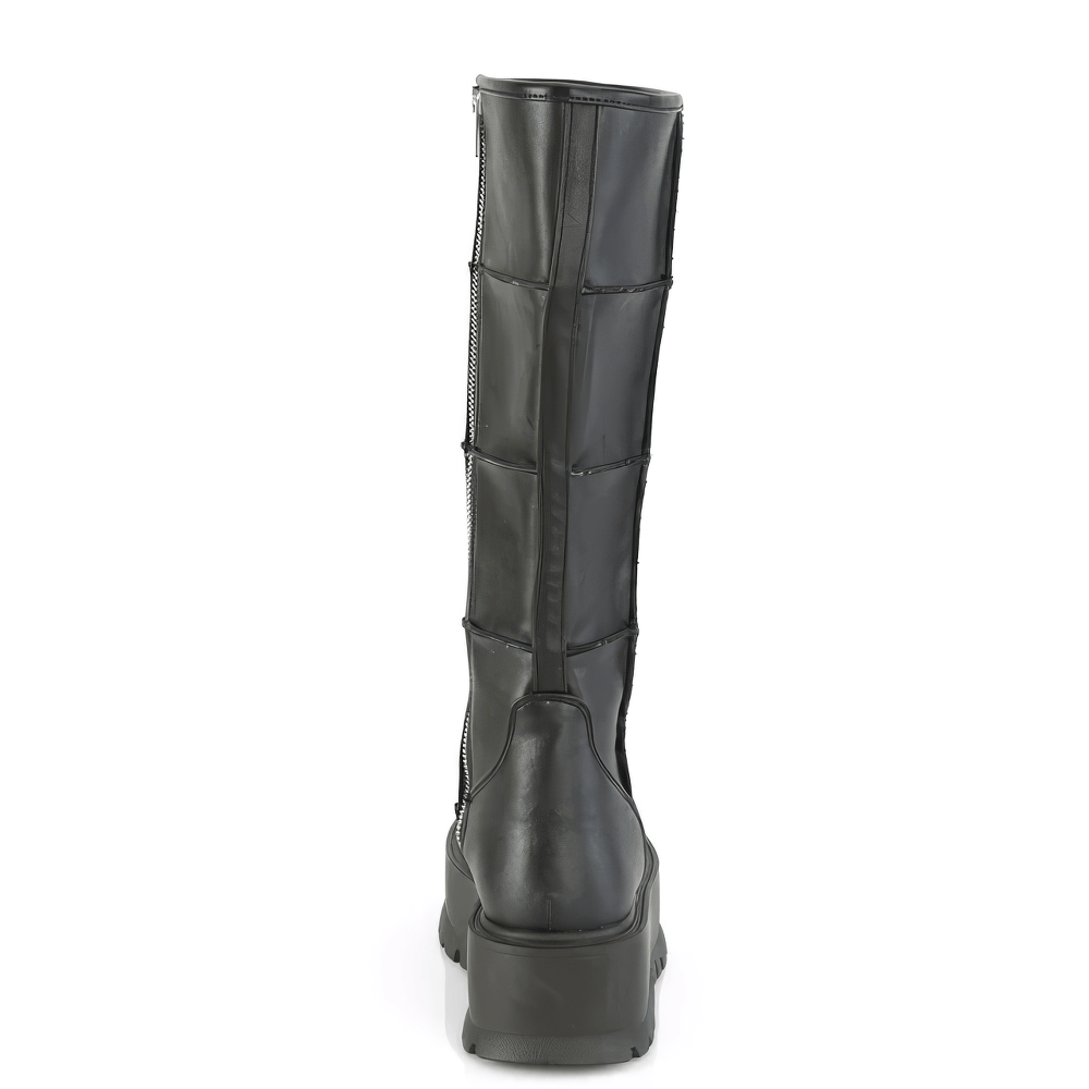 Back view of DEMONIA women's bold black knee high platform boots with zipper detail.