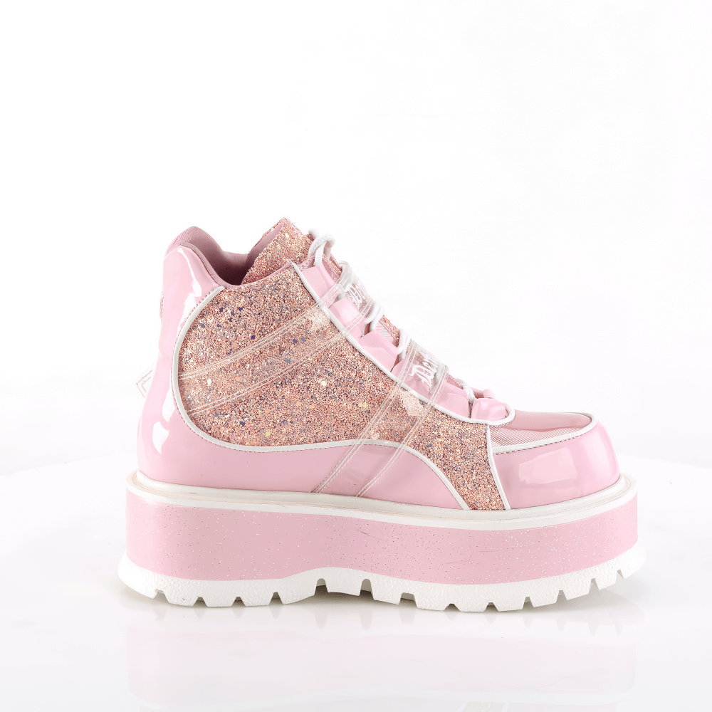 Pink glitter strap platform ankle boots for women with lace-up front and padded collar.
