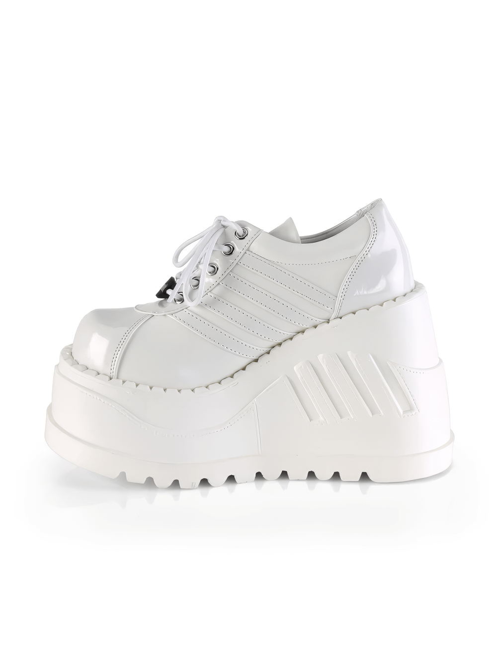 Dramatic white lace-up platform sneakers with 4 3/4" wedge, crafted from shiny vegan leather for bold style.
